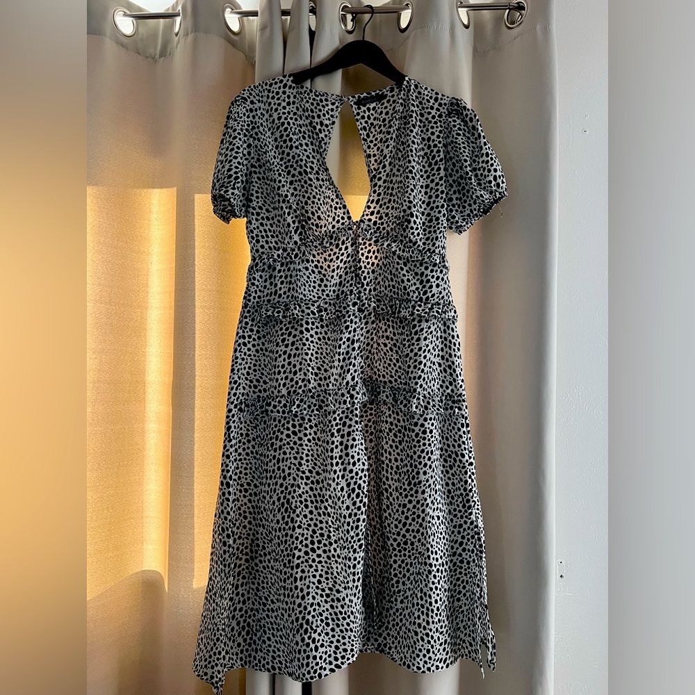 Boohoo size 10 dress with open back. No stretch. Fits like a size 8.
